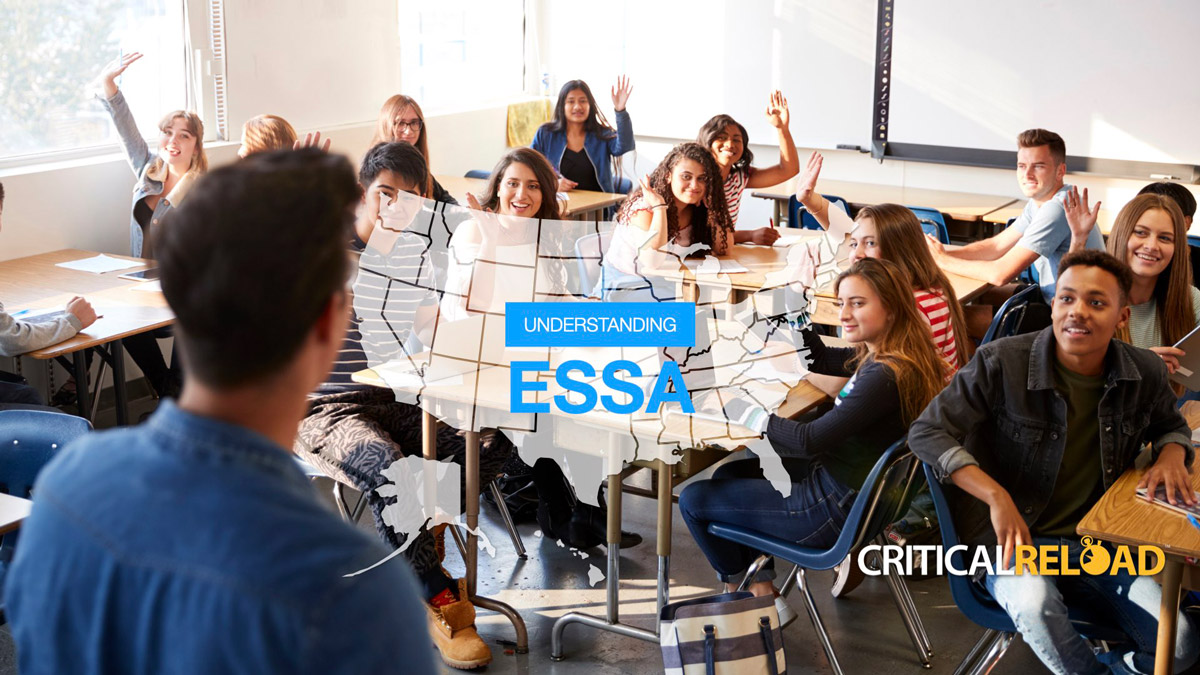 Rear View Of Male High School Teacher Standing At Front Of Class Teaching Lesson attined through Every Student Succeeds Act (ESSA)