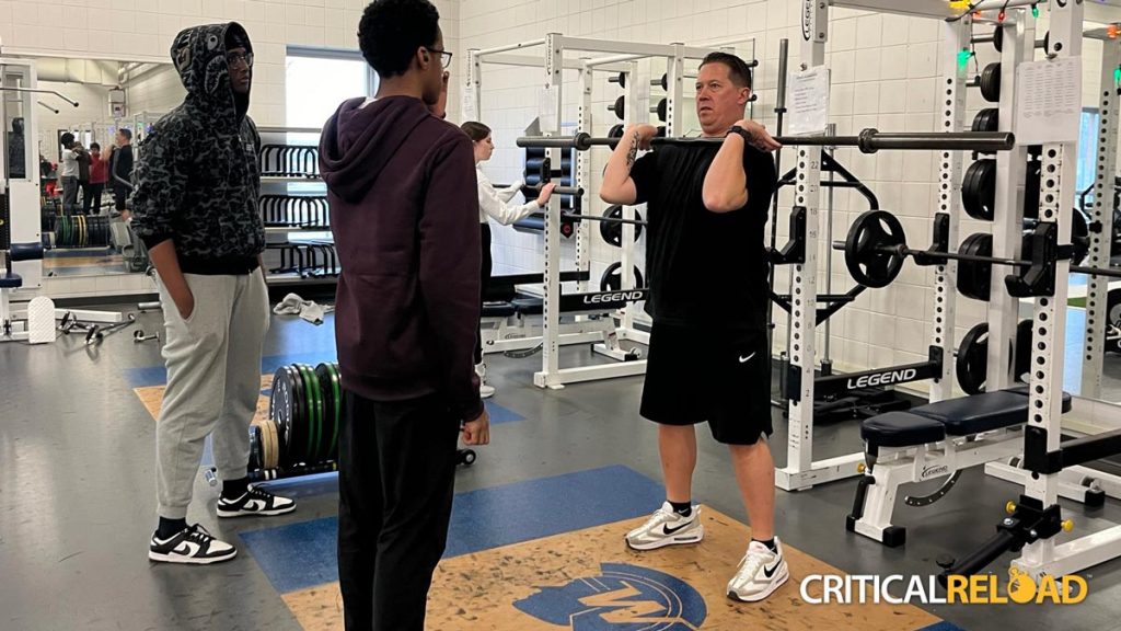 Coach Ryan Johnson elevates the physical training with nutrition knowledge by incorporating Critical Reload's educational content into his sessions.