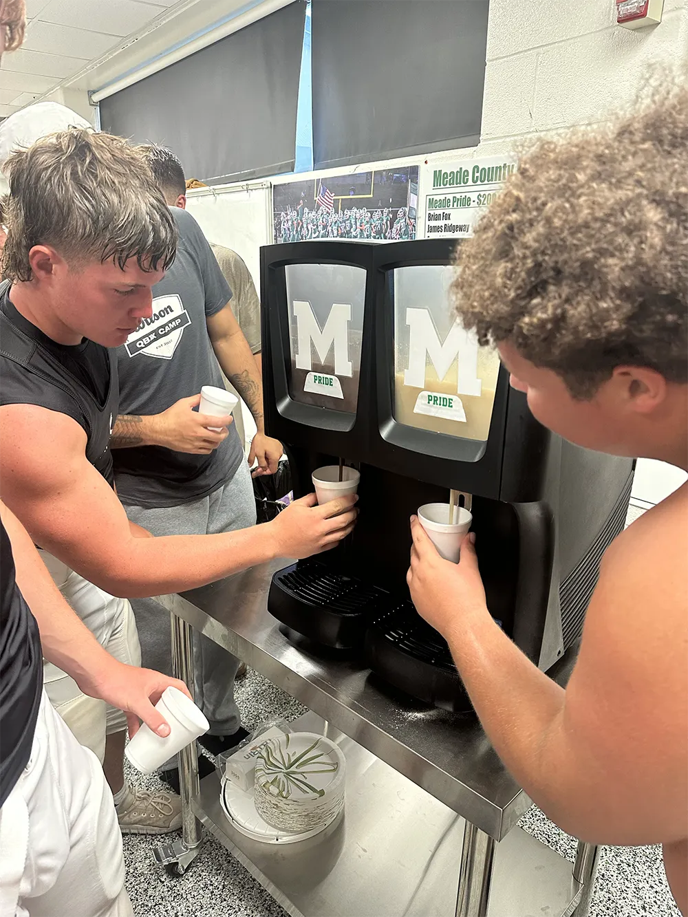 Critical Reload dispenser installed in a school athletic setting